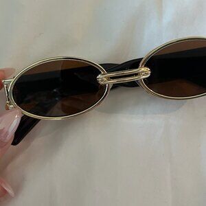 Chunky gold sunglasses